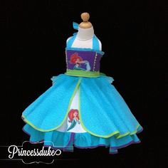 "Princess Ariel The Little Mermaid Inspired Princessduke Pageant Dress Ariel the little mermaid dress!! This custom dress was created for my little princess. I took her to see an amazing performance of the Little Mermaid musical at the performing arts center in Tampa. It was performed by children and melted our hearts! loved seeing her twirl in this fundress! The back is finished with an elastic waistband. The dress is lined and the skirt has two layers. At the waist Tulle springs out with a spl The Little Mermaid Dress, Little Mermaid Musical, Little Mermaid Crafts, The Little Mermaid Musical, Little Mermaid Dress, Belle Gown, Mermaid Tutu, Little Mermaid Dresses, Disney Dress Up