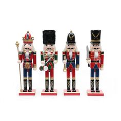 four wooden nutcrackers are lined up