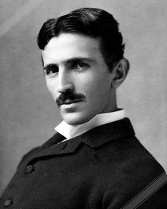 an old black and white photo of a man with a mustache