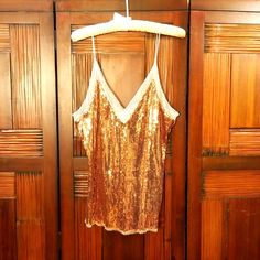 Free People Rosegold Sequin Camisole Top Womens M/L Has Stretch Never Worn But Tags Removed Mesh Detail At Top And Hem Small Square Sequins Gold Sleeveless Camisole For Night Out, Gold Cami Tank Top For Night Out, Gold Spaghetti Strap Camisole For Party, Gold Sleeveless Camisole For Summer, Gold Sleeveless Summer Camisole, Sleeveless Gold Camisole For Summer, Gold Tank Top For Summer Night Out, Glamorous Summer V-neck Camisole, Spring Gold Cami Tank Top