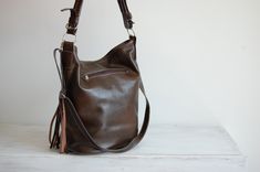 LEATHER TOTE Bag, Women's Handbag Leather Hobo Bag Large Tote Leather Handbag Large Cross Body Leather shoulder Bag Brown Leather Hobo Bag This Handbag is the perfect size to carry your daily essentials in style! It is made from high quality leather. This leather bag can be used as a tote and messenger bag. By using the adjustable leather strap you can convert it into a crossbody bag. This leather bag is a perfect everyday bag! There is a lot of space and you can put there everything in your eve Crossbody Bucket Bag With Tassels For Travel, Travel Crossbody Bucket Bag With Tassels, Travel Bucket Bag With Tassels And Crossbody Shape, Everyday Use Bucket Shoulder Bag With Tassels, Daily Use Bucket Shoulder Bag With Tassels, Everyday Rectangular Hobo Bag With Tassels, Everyday Bucket Shoulder Bag With Tassels, Everyday Rectangular Shoulder Bag With Tassels, Travel Shoulder Bag With Tassels