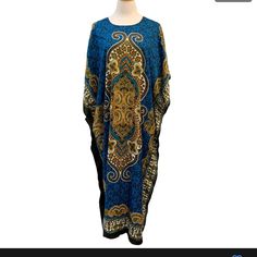 New With Tags! Gold Coast Maxi Length Kaftan In One Size. Beautiful Blue Paisley Pattern. 100% Polyester. Machine Washable. Lightweight And Comfortable. Glitter Detail Chest: 33.5” Across Shoulder To Hem: 50” Questions? Leave A Comment Below! Casual Long Blue Kaftan, Casual Blue Kaftan, Blue Casual Kaftan For Festivals, Casual Blue Kaftan For Festival, Blue Long Kaftan With Floral Print, Blue Long Floral Print Kaftan, Long Blue Floral Print Kaftan, Blue Casual Kaftan With Batik Print, Casual Blue Kaftan With Batik Print