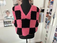 This crochet sweater vest features Pink and Black checks and is inspired by Kpop idol Jungwon of Enhypen's vest he wore during a performance. Size: Medium Material: acrylic yarn Handmade Crochet Checkered Sweater, Pink And Black Crochet, Checkered Sweater Vest, Crochet Checkered, Checkered Sweater, Crochet Sweater Vest, Pull Crochet, Fun Crochet, Yarn Sizes