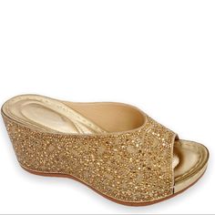 Italina Gold Metallic Rhinestone Embellished Wedge Scoop Platform Peep Toe Sandal Gleaming With Fashion These Light Reflecting Wedges Are Submerged In Gold Rhinestone Embellishments For The Ultimate Lavish Look Features: Brand: Atalina / Italina Color: Gold Material: Vegan Leather 3” Wedge Sandal Peep Toe Rhinestone Embellishments 1” Supportive Platform Padded Insole Metallic Sheen Gold Studded Embellished Rhinestone Open Toe Platform Wedge Sandals 8 Gold Rhinestone Open Toe Wedge Sandals, Gold Slip-on Wedge Sandals For Summer, Formal Crystal-embellished Wedge Sandals, Gold Leather Wedge Sandals With 4-inch Heel, Gold Synthetic Wedge Sandals With 4-inch Heel, Peep Toe Sandals, Platform Wedge Sandals, Gold Rhinestone, Womens Shoes Wedges