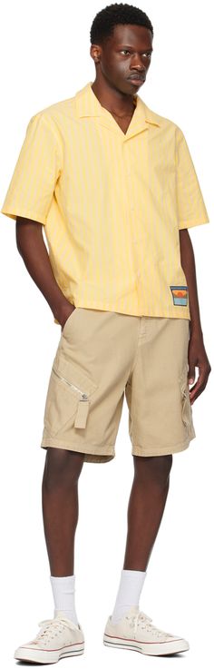 Boxy-fit cotton poplin shirt. Stripes throughout. · Open spread collar · Button closure · Logo patch at front hem Supplier color: Light yellow Yellow Cotton Camp Shirt With Relaxed Fit, Yellow Shirt With Pockets In Relaxed Fit, Yellow Shirt With Pockets Relaxed Fit, Yellow Relaxed Fit Shirt With Pockets, Shirt Stripes, Resort Shirt, Cotton Poplin Shirt, Poplin Shirt, Light Yellow