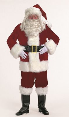 a man dressed as santa claus standing in front of a white background