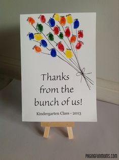 a card with the words, thanks from the bunch of us on it and colorful balloons