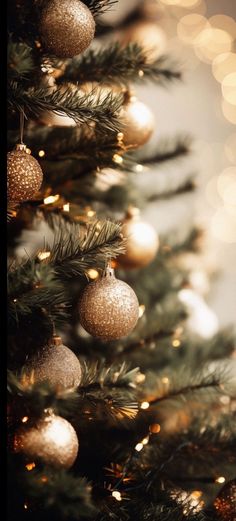 a christmas tree with ornaments hanging from it