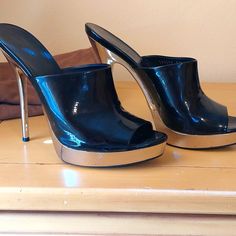 Super High, 5 1/2 Inch Heel. Make A Statement In These! Comes With A Gucci Pouch For Each Shoe. One Set Of Extra Black Heel Rubbers. A Few Scuff Marks Shown In Photo And Bottom Soles Need A Refresh. Designer Patent Leather Slip-on Heels, Modern Formal Gucci Heels, Gucci High Heels For Galas, Gucci Luxury Slip-on Heels, Designer Gucci Heels For Night Out, Modern Black Gucci Heels, Luxury Gucci Slip-on Heels, Glamorous Gucci High Heel Shoes, Gucci High Heels For Cocktail