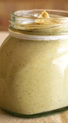 a jar filled with food sitting on top of a table