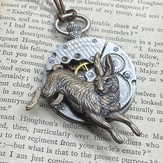 White Rabbit Watch Necklace  #artjewelry #vintagejewelry #upcycle #statementjewelry #fantasy #victorianjewelry #madhatter #reimagined #victorianmagpie #handmadejewelry Moon Goddess Necklace, Antique Pocket Watch, Ruby Jewel, Pocket Watch Necklace, The White Rabbit, Vintage Timepiece, Goddess Necklace, Pocket Watch Antique, Antique Keys