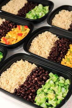 six plastic trays filled with rice, beans and veggies on top of each other