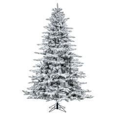 a white christmas tree with snow on it's branches and the base in black and white