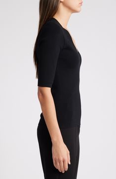 Build up your basics wardrobe with this V-neck top boasting raised seams at the shoulders for stylish flair. 23" length V-neck Elbow-length sleeves 63% viscose, 36% polyamide, 1% elastane Hand wash, dry flat Imported Fine Knit V-neck Top For Work, Fitted Viscose Tops For Night Out, Elegant Fine Knit Tops For Night Out, Chic Stretch V-neck Top For Work, Modern Solid Color V-neck Tops, Fitted Top With Asymmetrical Neckline For Workwear, Elegant Solid Color V-neck Knit Top, Sleek Fine Knit Tops For Workwear, Sleek Fine Knit Tops For Work