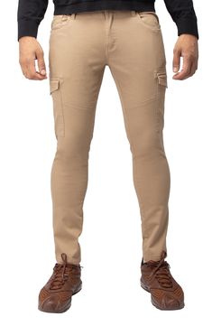 Solid chino pants constructed from comfortable stretch twill feature roomy cargo pockets for contemporary style. 13" leg opening; 9 3/4" front rise (size 32x32) Zip fly with button closure Five-pocket style Leg cargo pockets Skinny leg Stretch twill construction 64% cotton, 33% polyester, 3% spandex Machine wash, tumble dry Imported Model stats: 6'1" height, 32" waist. Model is wearing size 32x32. Utility Chino Cotton Twill Pants With Pockets, Utility Pants In Chino Cotton Twill With Pockets, Chino Cotton Twill Cargo Pants With Tapered Leg, Utility Chino Cotton Twill Cargo Pants Straight Leg, Straight Leg Chino Cotton Twill Cargo Pants, Chino Cotton Twill Cargo Pants With Pockets, Fitted Khaki Cargo Pants With Patch Pockets, Fitted Cargo Pants With Side Pockets And Tapered Leg, Fitted Cotton Cargo Pants With Functional Pockets