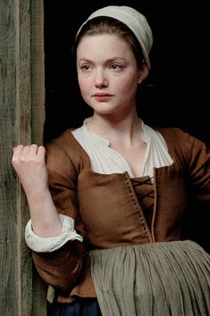 a painting of a young woman leaning against a wooden wall with her hand on the door