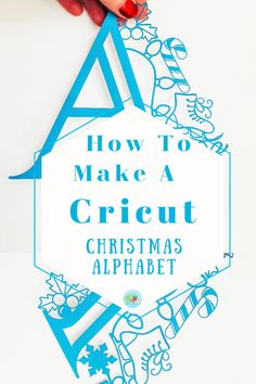 someone is making a cricut christmas alphabet for their child's craft project