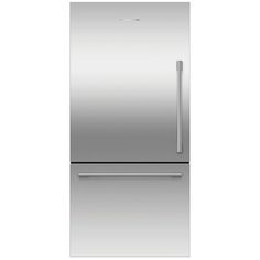 a silver refrigerator freezer sitting on top of a white floor