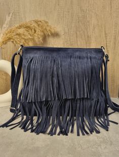 Soft Real Suede Leather Navy Fringe Tassel Crossbody Bag/ Suede Leather Dark Blue Shoulder bag Fringe bags/ Blue Suede Bags Gifts for her Zipper closure on top  2 fringed layers design  Back zipped pocket  Internal zipped pocket  Silver tone metal hardware  Fully lined inside  Soft Real Suede Leather  Handle drop: 60cm  Dimensions: H30cm x W32cm x D4cm Blue Fringe Bags For Daily Use, Blue Tassel Bags For Daily Use, Blue Shoulder Bag With Tassels For Daily Use, Blue Fringe Shoulder Bag For Daily Use, Blue Bag With Tassels For Everyday Use, Blue Shoulder Bag With Tassels For Everyday Use, Blue Everyday Bag With Tassels, Blue Shoulder Bag, Fringe Bags