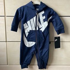 Never Worn Has A White Mark On The Back Haven’t Tried Getting It Out, That’s How I Got It Nike Cotton Onesie For Loungewear, Nike Casual Long Sleeve Onesie, Sporty Cotton Long Sleeve Onesie, Sporty Long Sleeve Cotton Onesie, Nike Casual Onesie For Playtime, Casual Nike Onesie For Playtime, Nike Cotton Onesie For Playwear, Blue Cotton Hooded Onesie, Nike Romper