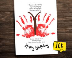 a handprinted birthday card with an image of a person's hands on it