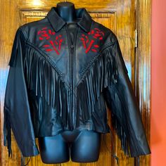 Beautiful Nwot Motorcycle Riding Leather Jacket Black With Red Suede Roses On The Front And Back Beautiful Fringe Detail Very Heavy Riding Leather Removable Zip Out Lining Pit To Pit Measurement Is 20.5” Shoulder To Bottom Hemline Measurement Is 25” Sleeve Length Is 23.5” Waist Measurement Is 18.5” Accross And Has Stretchy Elastic On The Back Adjustable Ties On The Sides See Pictures Harley Davidson Fzcle Black Western Leather Jacket For Winter, Western Style Black Leather Jacket For Winter, Black Fitted Western Outerwear, Fitted Black Western Outerwear, Fitted Black Western Leather Jacket, Black Fall Outerwear For Rodeo, Black Outerwear For Fall Rodeo, Black Long Sleeve Outerwear For Rodeo, Black Western Leather Jacket