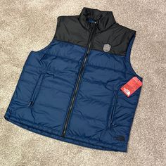 Tag Was Pulled Off But This Was Never Worn. Every Day Insulated Vest In Shady Blue Color. Custom Logo. Sleeveless Outerwear For Hiking In Fall, Sleeveless Fall Hiking Outerwear, Sleeveless Outerwear For Fall Hiking, Sleeveless Fall Outerwear For Hiking, Navy Sleeveless Outerwear With Pockets, Sleeveless Blue Outerwear For Outdoor Activities, Casual The North Face Cold Weather Outerwear, Navy Outerwear For Hiking In Fall, Navy Outerwear For Fall Hiking