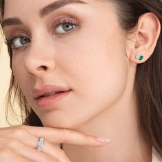 Truly brilliant, these two-stone stud earrings can enhance your style in an instant. They're a good alternative to basic solitaire studs, perfect for when you want to add a bit more glitter and glamour to your looks while still keeping an understated look. The earrings feature an oval diamond and created Emerald pear mounted on an angle, side-by-side, for an edgier style. Blue Wedding Band, Something Blue Wedding, Solitaire Studs, Gorgeous Engagement Ring, Diamond Anniversary Rings, Stone Studs, Emerald Gemstone, Fine Jewelry Gift, Oval Diamond