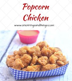 popcorn chicken in a blue and white bowl