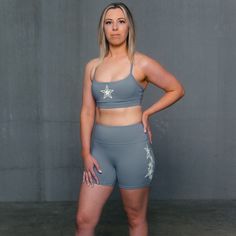 The sports bra’s are medium support & crafted out of a nylon spandex blend. Making them ultra-soft and comfortable for all different body shapes / sizes. They run true to size, and are available in size XS – 3XL. SPORTS BRAS FIT TRUE TO SIZE Model size reference: Size Small Top, 5'6 145lbs, 28" waist, 34B Gray Athletic Fit Sports Bra For Yoga, Compressive Sporty Gray Sports Bra, Compressive Gray Sports Bra, Gray Compression Sports Bra For Training, Gray Sports Bra Friendly For Sports, Gray Racerback Sports Bra For Light Sports, Gray Sports Bra With Light Support, Gray Athletic Fit Sports Bra For Gym, Gray Sweat-resistant Sports Bra For Light Sports