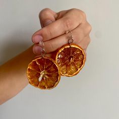 Real dried oranges that glow in the sunlight. Dried Oranges, Orange Earrings, Pittsburgh Pa, Pittsburgh, Halloween Shopping, Jewelry Earrings Dangle, Etsy Earrings, Dangle Drop Earrings, Dangle Earrings