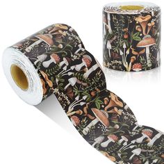 a roll of black and white tape with an image of mushrooms, mushrooms and leaves on it