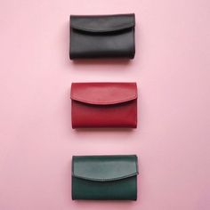 Crafted from italian cow leather, the Mini Wallet features two card slots which can carry up to 6 cards in total, a coin case and a large pocket for bills. Each bag is thoughtfully handmade in small batches to ensure quality and attention in detail. Width: 10cm Height: 7,5cm Depth: 2cm 100% Cow leather Manufactured in Munich, Germany. Small Leather Wallet, Mini Bucket, Mini Bucket Bags, Munich Germany, Purple Bags, Mini Wallet, Mini Purse, Etsy Fashion, Green Bag