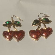 Sparkly Shiny Bright Red Nautical Whimsical Heart Shaped Cherry Earrings. In Excellent Condition, New And Never Worn. Retro Red Earrings For Summer, Green Earrings For Valentine's Day Party, Retro Red Summer Jewelry, Cherry Colored Earrings For Summer Party, Cherry Color Earrings For Summer Party, Cute Metal Earrings For Party, Trendy Red Metal Earrings, Cherry Colored Jewelry For Valentine's Day Party, Cherry Color Jewelry For Valentine's Day Party