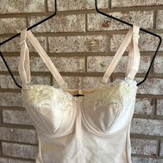 Old Unworn Stock From A Huge Private Collection No Smoke Or Pets Color Is Beige/ Tan . Not White. Not Peach . It Measures 18” From Center Bust To Snap In Crotch, Straps Are Removable. Bra Is Underwire Hooks Are Metal Bra Is Padded Fitted Lace Trim Bra For Wedding, Fitted Pink Bra For Wedding, Fitted Bra With Lace Trim And Sweetheart Neckline, Fitted Bra-friendly Camisole In Coquette Style, Fitted Lace Trim Camisole Bra, Fitted Bra With Boned Bodice, Wedding Underbust Fitted Bra, Fitted Underbust Bra Partially Lined, Feminine Fitted Camisole Bra