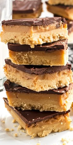 chocolate and peanut butter bars stacked on top of each other