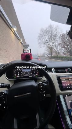 the dashboard of a car is shown with an image of a camera on it's dash board