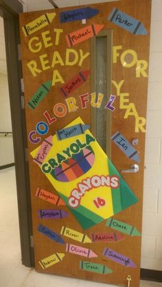 a door decorated with different colored papers and words that read get ready, for a colorful year