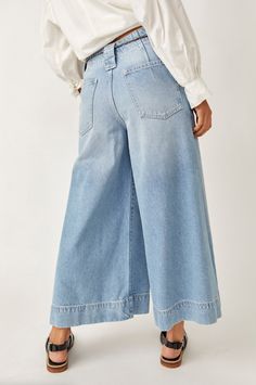 Forever cool with retro-inspired charm, these statement jeans from our We The Free collection are the perfect elevated addition to any denim drawer. Crop Wide Leg Jeans, Statement Jeans, Shady Lady, Cropped Wide Leg Jeans, Blue Socks, Free People Style, Faded Jeans, Bright Eyes, Tie Belt