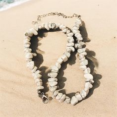 Handmade necklace with white marbled howlite stones. Adjustable (35-40 cm) with stainless steel clasp. 🌊 🏊✅ Pool & ocean proof.  📦✅ Shipped FREE in the UK and dispatched on the SAME DAY where possible. 🎁✅ Gift wrap option available.  Visit our Etsy site to view other Ben's Beach jewellery --> https://www.etsy.com/uk/shop/BensBeach 🌐 Visit our main site --> https://bensbeach.com/ to view our wider selection and subscribe for updates (we do not spam) re new jewellery and offers. Follow Ben on Everyday White Beaded Necklaces With Natural Stones, White Shell Necklace With Gemstone Beads For Beach, Adjustable White Beaded Necklace With Natural Stones, White Natural Stones Jewelry For Beach, Handmade White Crystal Necklace For Beach, White Minimalist Adjustable Crystal Necklace, White Adjustable Shell Necklace With Gemstone Beads, White Faceted Beads Necklace For Beach, White Shell-shaped Beaded Necklaces For Beach