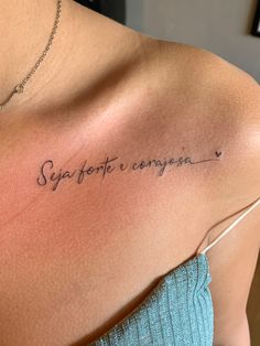 the back of a woman's shoulder with writing on it that says, supafofii compressa