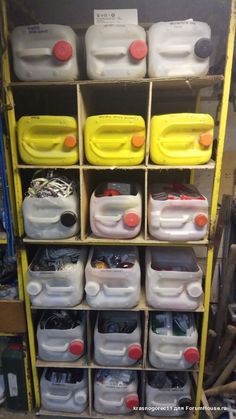 the shelves are filled with plastic containers and other things to use in this storage area