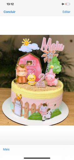 a birthday cake with farm animals on it