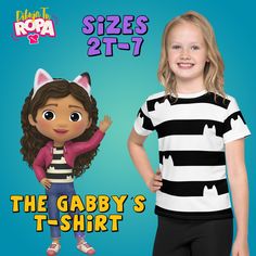 Look identical to Gabby on Netflix's hit Gabby's Dollhouse with this stripped t-shirt with gorgeous kitties. Impress your friends with a cat-tastic style! Join Gabby's dollhouse! * 95% polyester, 5% elastane (fabric composition may vary by 1%) * Fabric weight: 6.19 oz/yd² (210 g/m weight may vary by 5% * Premium knit mid-weight jersey * Four-way stretch fabric that stretches and recovers on the cross and lengthwise grains * Regular fit * Crew neck * Blank product components in the US and Mexico sourced from the US * Blank product components in the EU sourced from Lithuania This product is made especially for you as soon as you place an order, which is why it takes us a bit longer to deliver it to you. Making products on demand instead of in bulk helps reduce overproduction, so thank you fo The Cross, Kids Tops, Stretch Fabric, Kids Tshirts, Doll House, Kids Outfits, Birthday Gifts, T Shirt