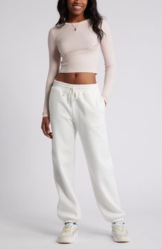 Get into cozy mode with these oversized sweatpants made with soft fleece and the essential elastic waist. Elastic/drawstring waist 68% cotton, 32% polyester Machine wash, tumble dry Imported Not available for sale and shipment to Germany Spring Sweatpants With Elastic Cuffs For Lounging, Relaxed Drawstring Joggers For Spring, Comfortable Spring Sweatpants With Elastic Cuffs, Comfortable Sweatpants With Elastic Cuffs For Spring, Relaxed Sweatpants With Elastic Cuffs For Spring, Athleisure Sweatpants With Ribbed Waistband For Spring, Spring Athleisure Sweatpants With Ribbed Waistband, Spring Athleisure Sweatpants With Straight Hem, Spring Sweatpants With Straight Hem And Comfortable Style