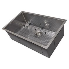 a stainless steel sink with grids on the bottom