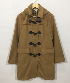 "*ITEM: Vintage Brooks Brothers Wool Coat Peacoat Jacket Large Vintage 1990s Brooks Brothers Classic Peacoat Coat Jacket Size L *ITEM DETAILS: 👇🏻 Please be aware that all vintage items will usually show a few signs of wear or fading due to age, but anything visible such as stains or holes, and serious flaws have been photographed.For any further information on this item please contact us and we will be happy to help. *SIZE: LARGE *ACTUAL SIZE MEASUREMENT: 👇🏻 *PIT TO PIT(WIDTH):21\"INCHES *LE Retro Long Coat For Fall, Classic Hooded Pea Coat For Fall, Classic Parka For Cold Weather In Fall, Classic Fall Parka For Cold Weather, Vintage Double-breasted Outerwear For Fall, Vintage Outerwear For Cold Weather In Fall, Vintage Outerwear For Cold Fall Weather, Hooded Pea Coat With Button Closure For Fall, Vintage Khaki Winter Outerwear