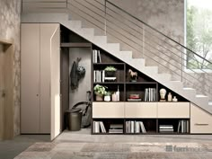 an open book shelf under the stairs in a room with carpeted flooring and beige walls