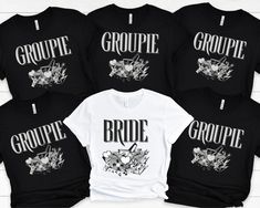 four black and white tshirts with the word groupe printed on one side