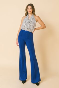 Hight-rise flare pants with center seam. Faux back pockets Details Self: 97% polyester, 3% spandex Imported Size & Fit - Model is 5`8" and wearing size Small - Measurements taken from size Small - Length: 45" Chic High-waist Flares For Night Out, Chic High Waist Flares For Night Out, Spring Wide-leg Flares For Night Out, Fitted High-waisted Flares For Night Out, Chic Stretch Flares For Night Out, Chic Fitted Wide Leg Flares, Chic Stretch Flare Jeans For Night Out, Chic Mid-rise Wide Leg Elastane Pants, Chic Stretch Mid-rise Flares